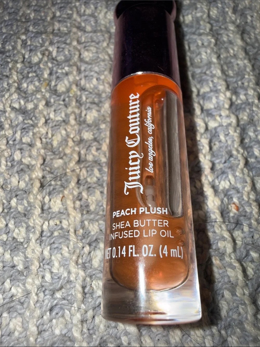 Juicy Couture Peach Plush Sheer Lip Oil in Peachy Orange